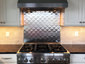 Quilted diamond stainless steel back splash installation