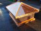 Copper chimney cap featuring standing seam hip roof panels with a flat portion - view 6