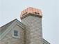 CH027 custom copper chimney shroud with standing seam panels - installation view 2