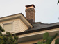 CH028 Custom 2 stage protection copper chimney cap with standard angled roof - installation photo - view 1