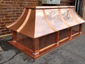 CH035 - Copper chimney cap with concave standing seam curved roof panels - view 2