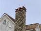 CH035 - Copper chimney cap with concave standing seam curved roof panels - installation view 1
