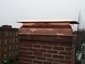 Non venting copper chimney cover for inactive chimney with angled base and flat roof - view 9