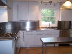 Stainless steel #4 finish counter top with integrated sink installation