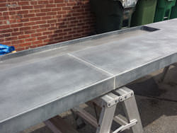 Dark patina zinc bar top with drink tray and brass pins - view 8