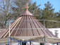 Copper roof with finial during installation - view 1