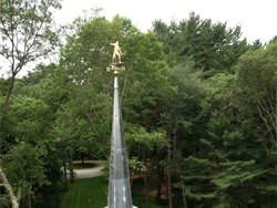 Lead coated copper steeple with weathervane