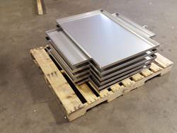 Stainless steel drip pans in fabrication