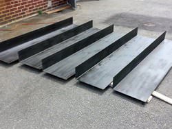 Custom blackened steel plates after