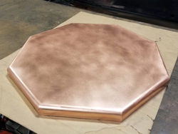 Custom copper octagonal base for wooden table