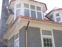 Half-round gutters with undermount hangers