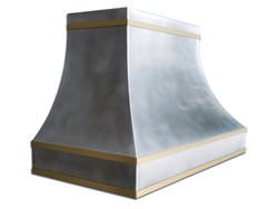 Zinc range hood with French curve, satin finish and brass bandings