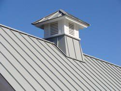 Gray aluminum roof with cupola detail