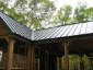 Standing seam charcoal gray steel metal roof - view 2