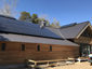 Bronze aluminum kynar standing seam roof with custom chimney cap - view 2