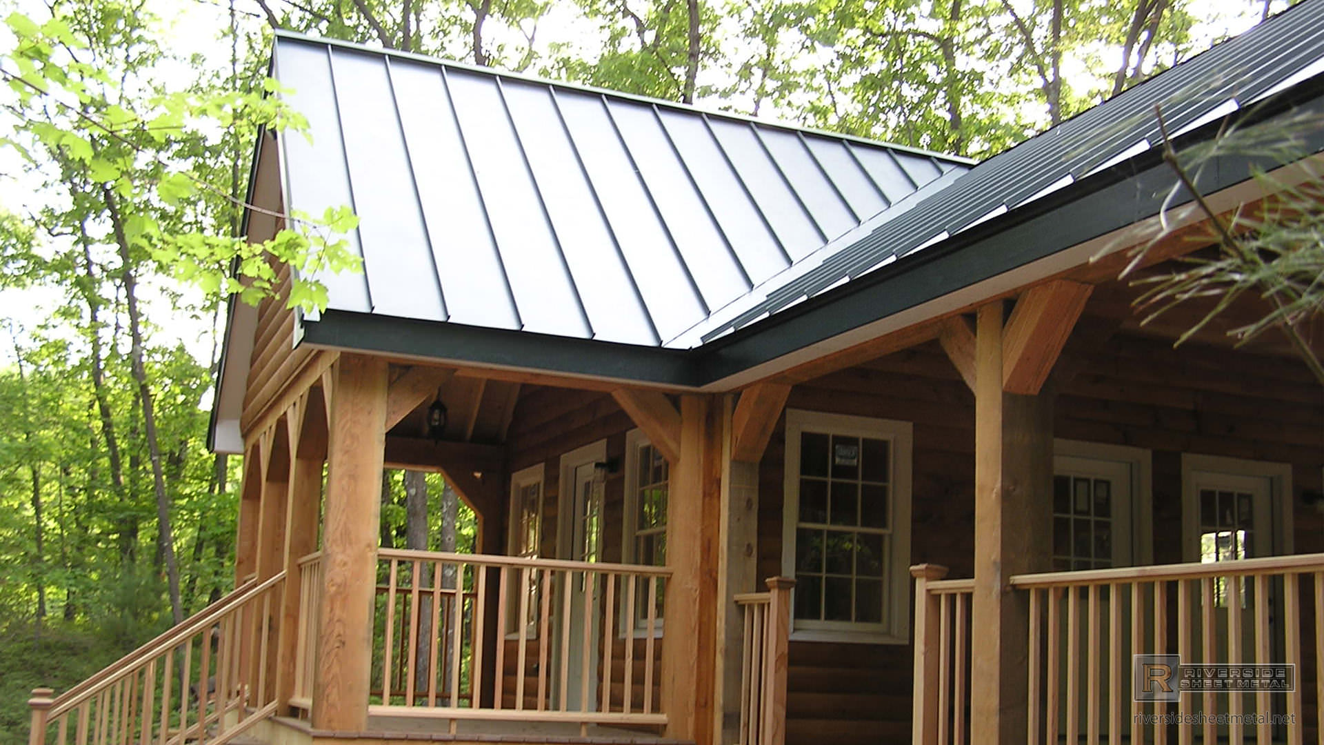 Standing seam charcoal gray steel metal roof  Metal Roofing