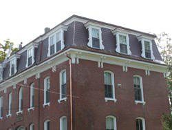 Curved copper panel roof installation