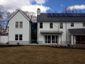 Freedom gray gutter, downspouts and metal roof panels - view 1