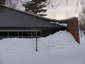 Standing seam metal roof during winter - view 1