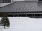 Standing seam metal roof during winter - view 2