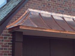 Installation of radius standing seam copper panels