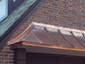 Installation of radius standing seam copper panels