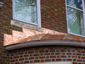 Round standing seam roof section in copper - view 3