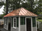 Shed with copper standing seam metal roof - view 2