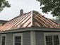 Shed with copper standing seam metal roof - view 4