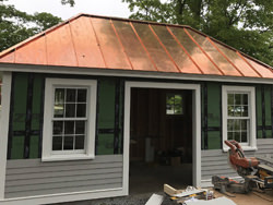 Shed with copper standing seam metal roof