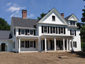 Standing seam matte black aluminum roofing with colorgard snow retention system and single bead gutter - view 5