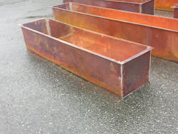 Copper flower boxes burnished
