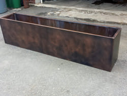 Flower box with custom dark patina finish applied