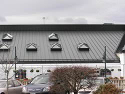 Aluminum skylights on a metal roof