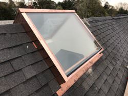 Custom made copper skylight on roof ridge