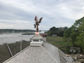 Custom copper weathervane - bald eagle catching a salmon - installation view 3