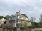 Custom copper weathervane - bald eagle catching a salmon - installation view 4